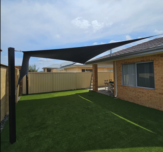 Residential shade sail over an outdoor entertaining area